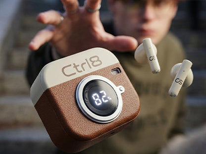 User showcasing CTRL8 Retro Camera Design Portable TWS Wireless Earbuds with stylish case and battery display
